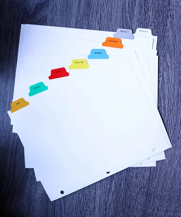 Multicolor index tab divider set fanned to show each tab position